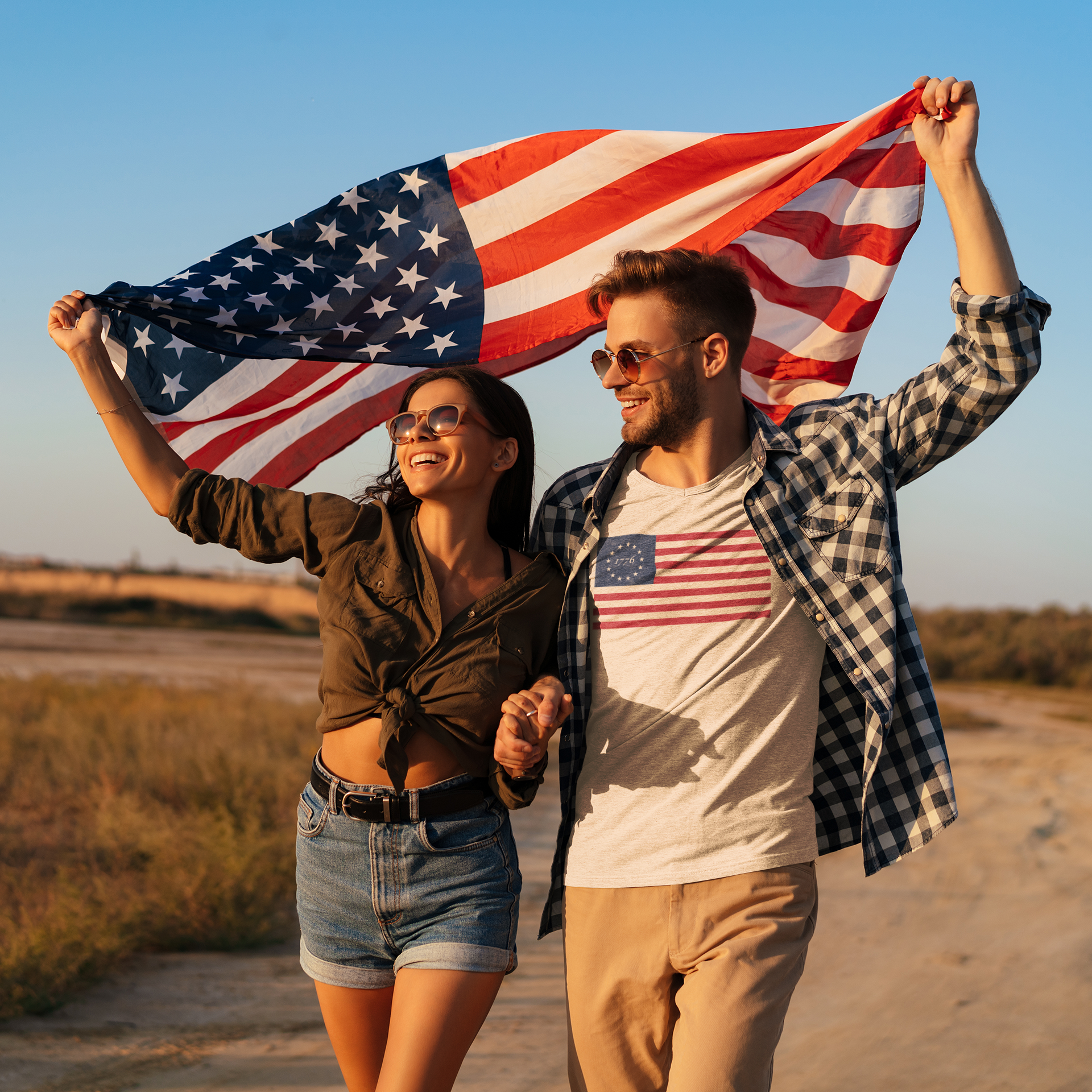 Couple holding an American flag