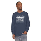 Man wearing a long-sleeve Midnight Comfort Colors t-shirt featuring Psalm 118:24 paired with a nature graphic 