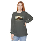 Woman wearing a long-sleeve Pepper Comfort Colors t-shirt with Leutze's 'Washington Crossing the Delaware' with 'America's First Christmas December 25, 1776 printed below