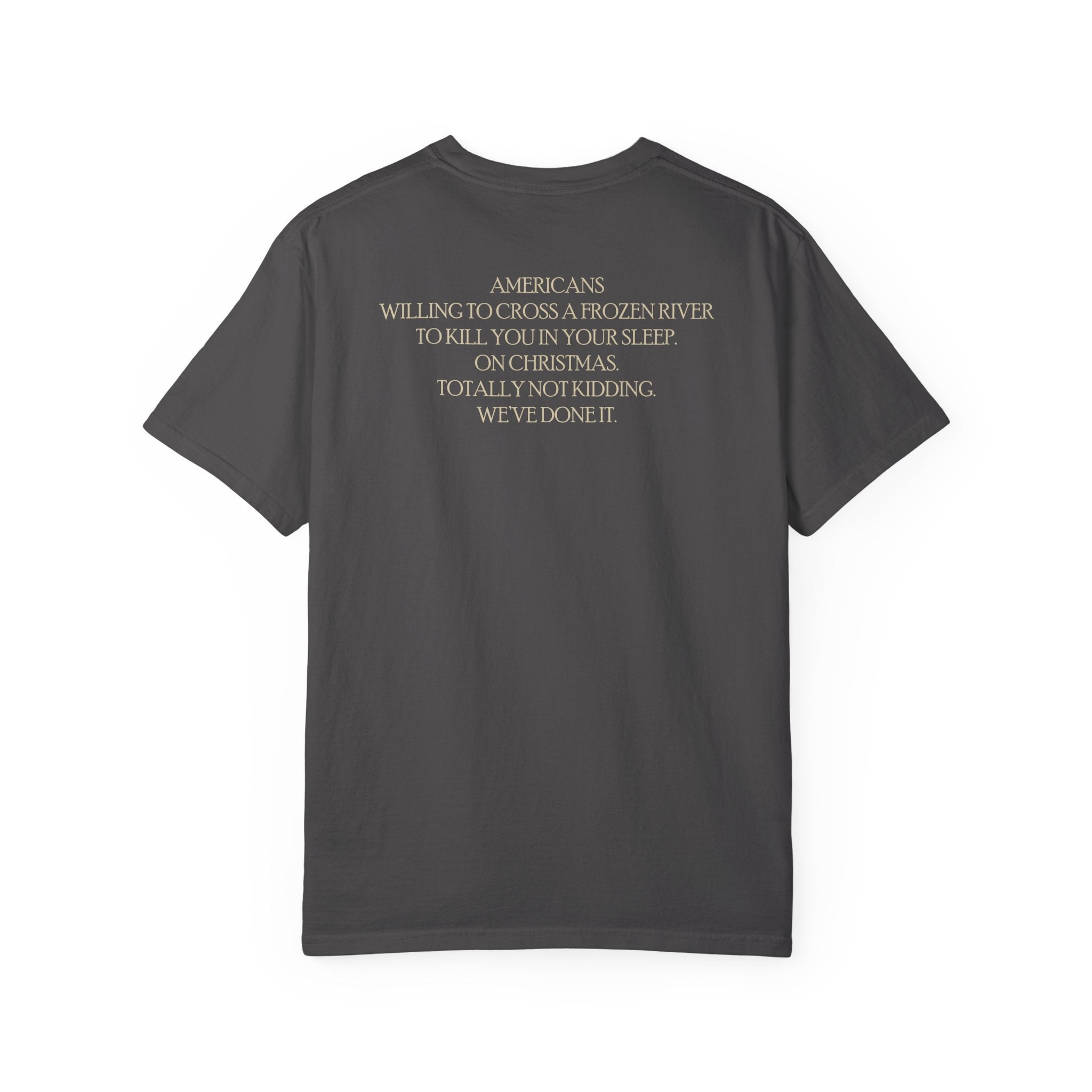 Back of America's First Christmas meme t-shirt with 'AMERICANS Willing to cross a frozen river to kill you in your sleep. On Christmas.' quote in Graphite