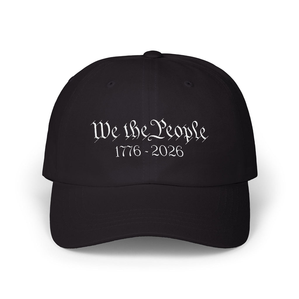 Black cap with embroidered 'We the People 1776-2026' against a white background