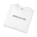 Folded white t-shirt with 'American Girl' in patriotic stars & stripes text