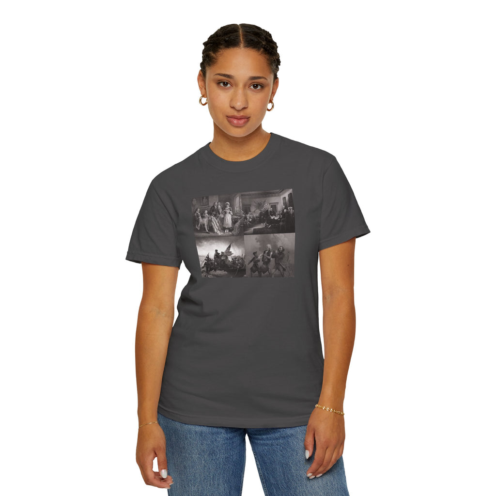 Woman wearing a Graphite Comfort Colors t-shirt printed with a montage of four revolutionary war era paintings