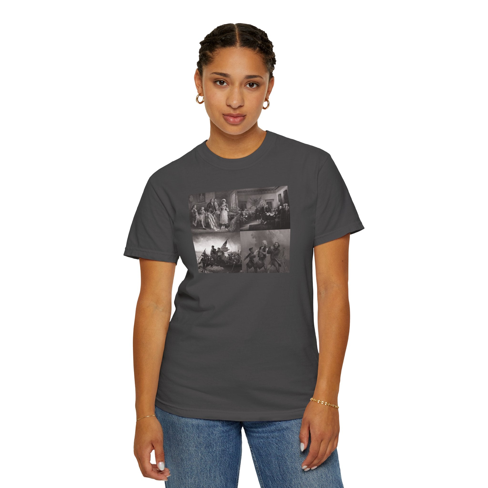 Woman wearing a Graphite Comfort Colors t-shirt printed with a montage of four revolutionary war era paintings