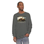 Man wearing a long-sleeve Pepper Comfort Colors t-shirt with Leutze's 'Washington Crossing the Delaware' with 'America's First Christmas December 25, 1776 printed below