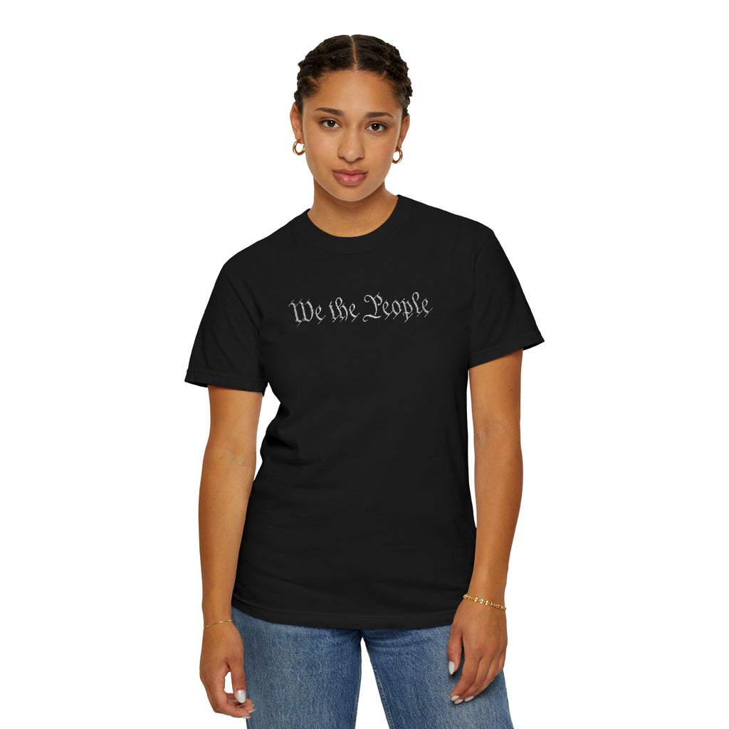 Woman wearing 'We the People' embroidered t-shirt in black