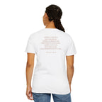 Back view of a woman wearing a White Comfort Colors t-shirt with a quote from Donald Trump