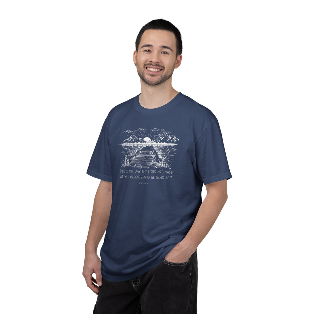 Smiling man wearing China Blue Comfort Colors t-shirt with nature graphic and Psalm 118:24 underneath
