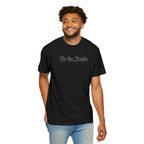 Smiling man wearing 'We the People' embroidered t-shirt in black