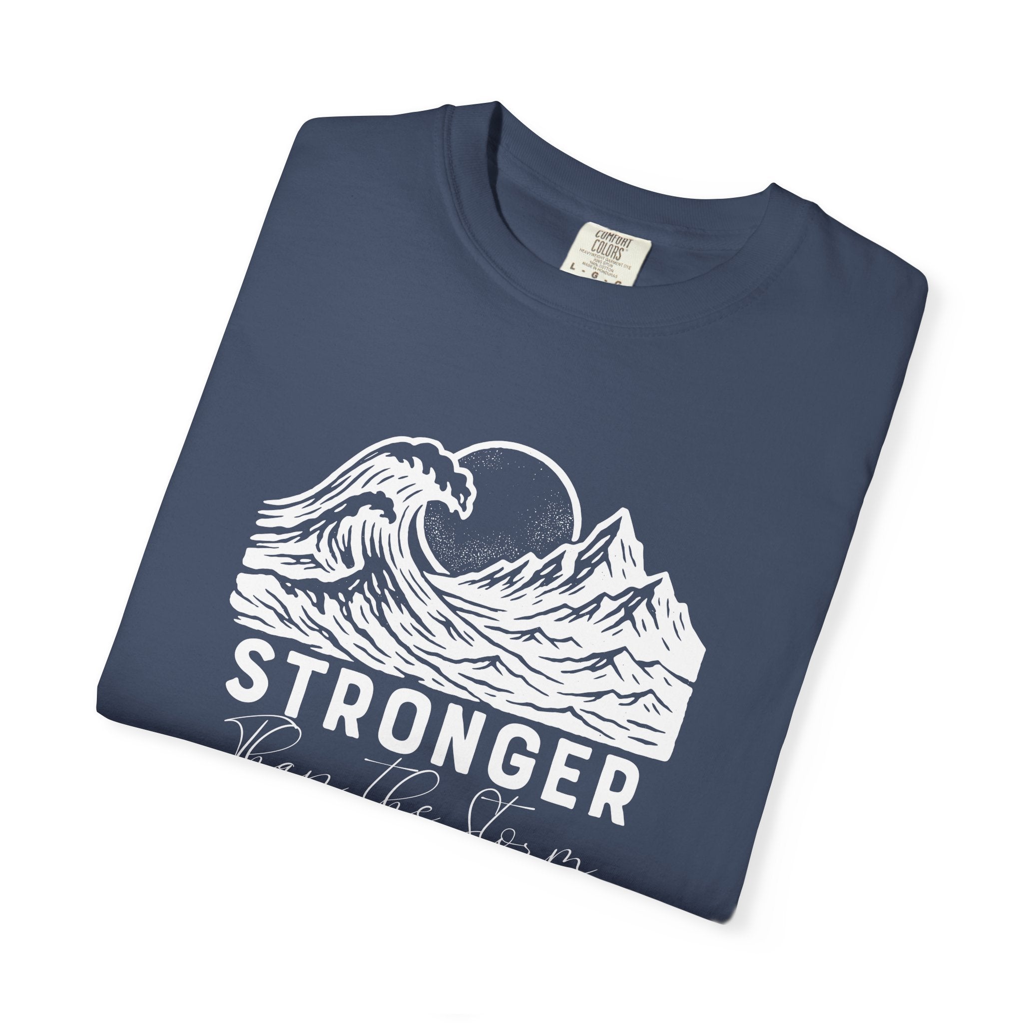 Folded Stronger Than The Storm Christian t-shirt in Midnight with a mountain wave sun design