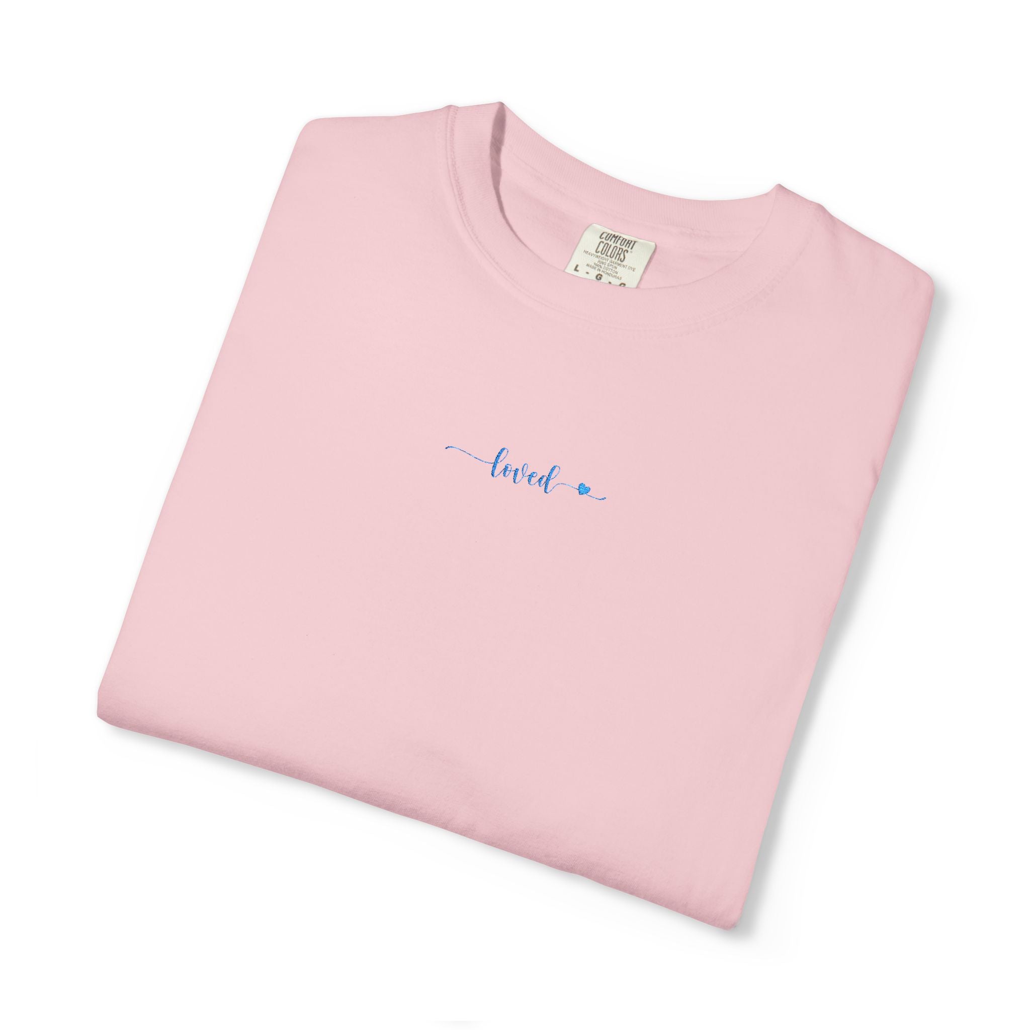 folded 'loved' embroidered t-shirt in blossom