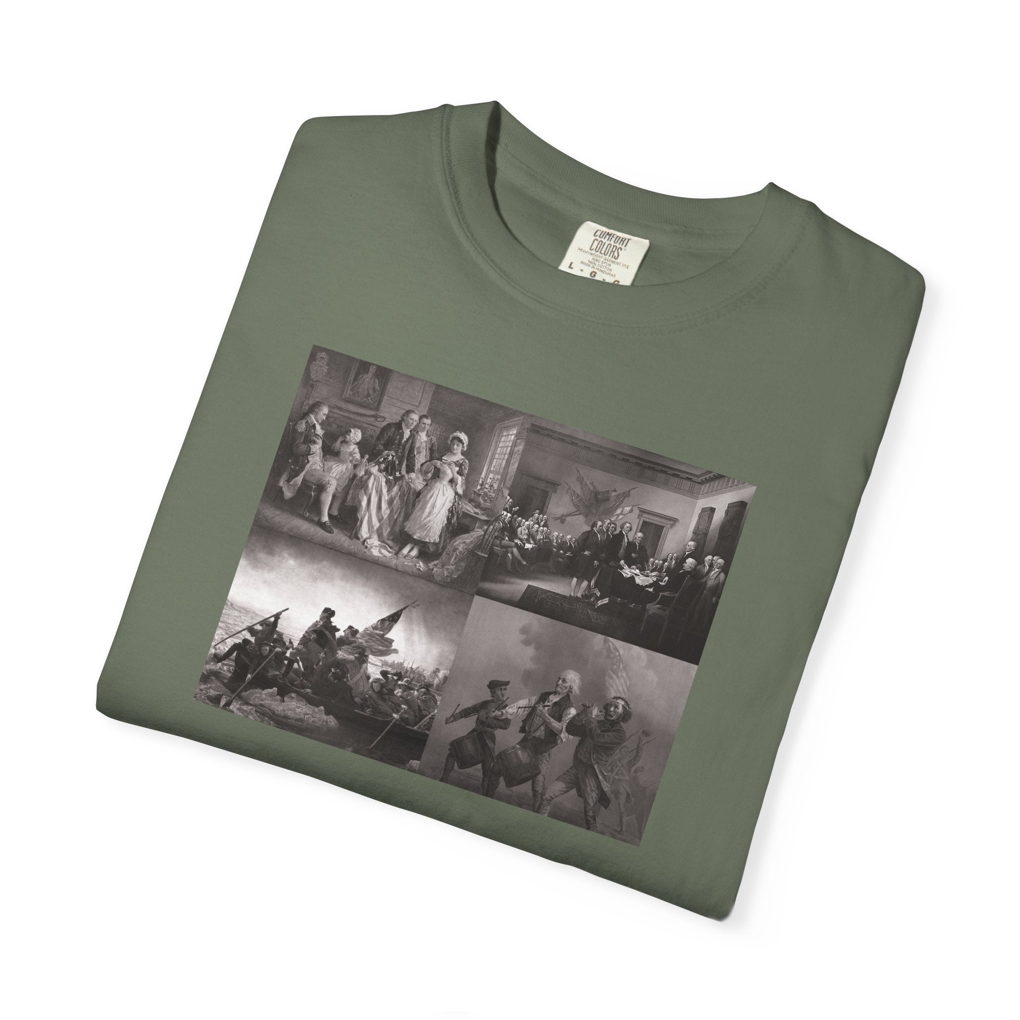 Folded Moss Comfort Colors t-shirt printed with a montage of four revolutionary war era paintings