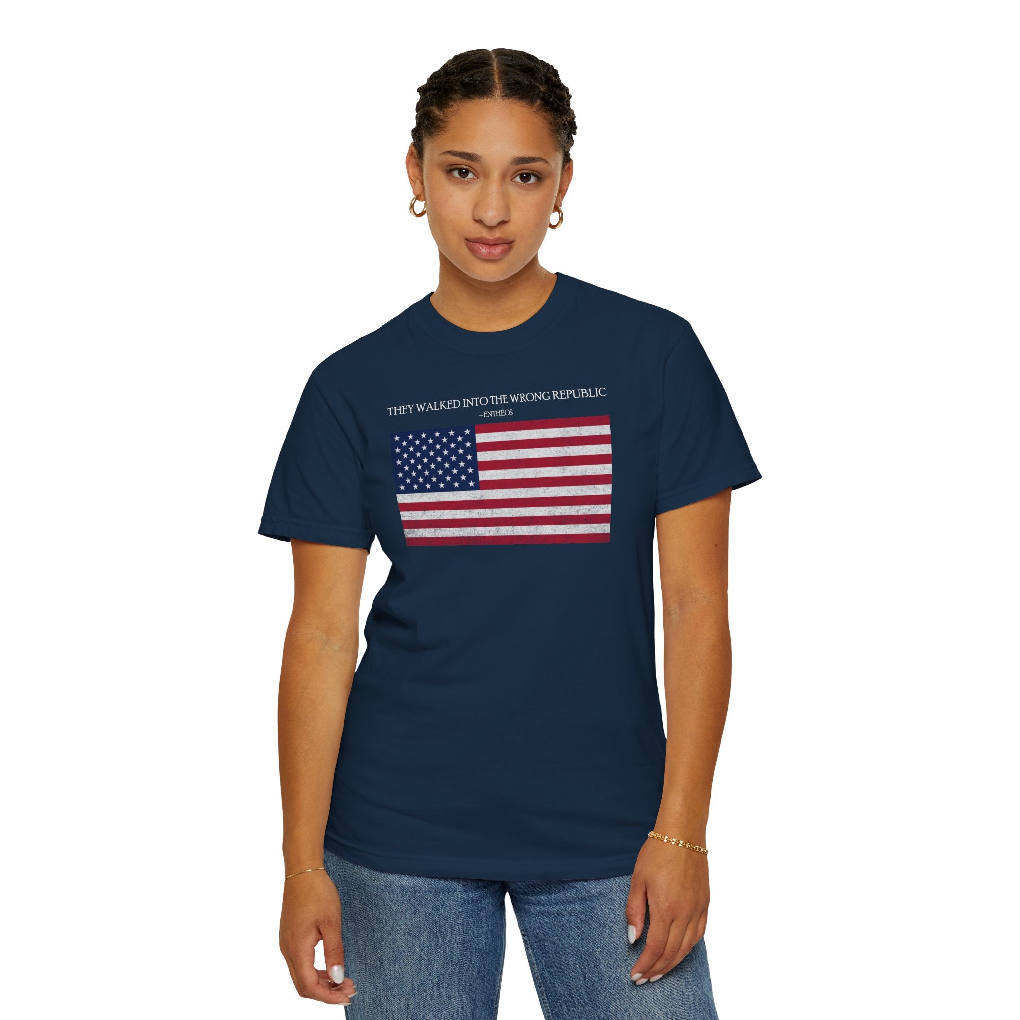 Woman wearing a True Navy Comfort Colors t-shirt with distressed American flag graphic and 'They Walked Into the Wrong Republic' quote from Entheos
