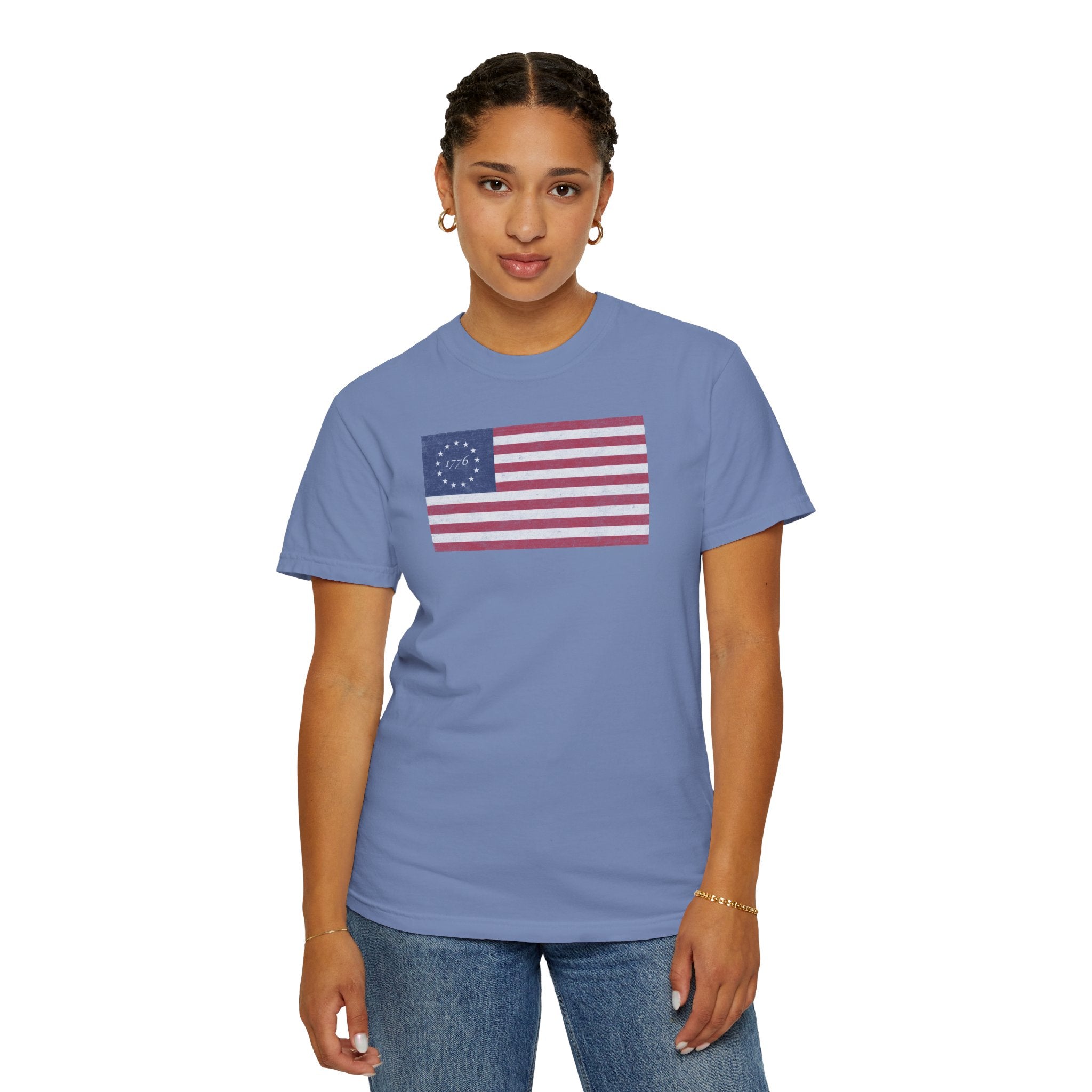 Female model wearing distressed 1776 Betsy Ross flag t-shirt in washed denim