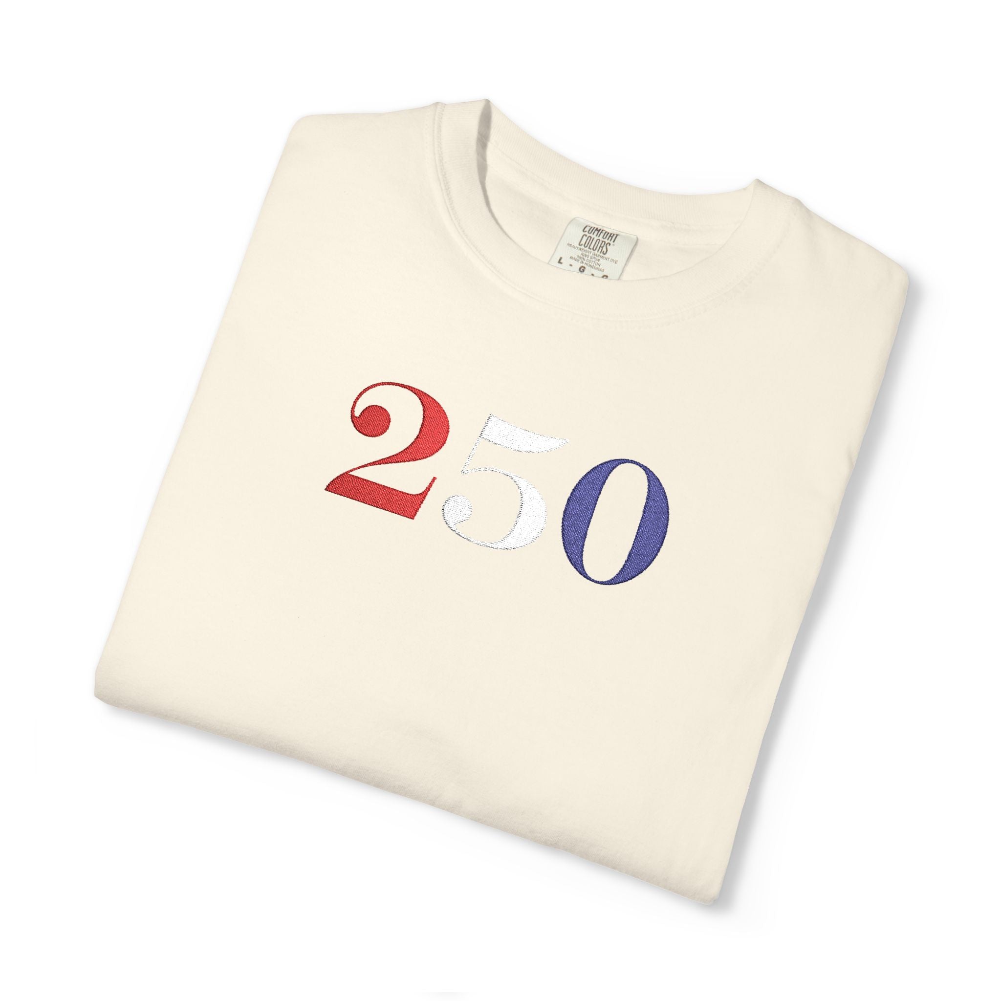 Folded ivory-colored t-shirt with '250' embroidered in red, white, and blue