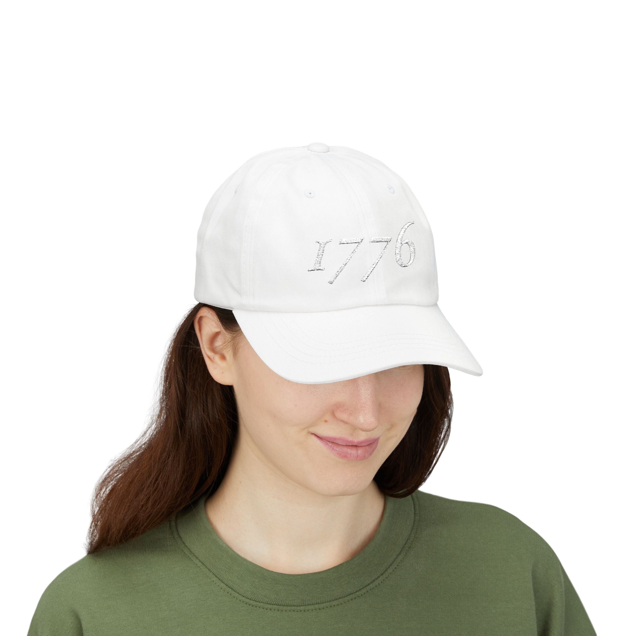 Front view of woman wearing a White dad cap embroidered with '1776'