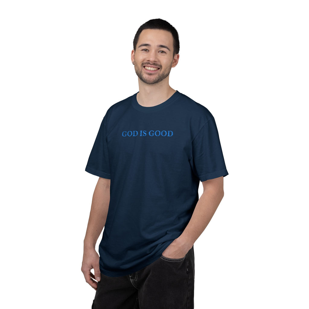 Smiling man wearing a True Navy Comfort Colors t-shirt with 'GOD IS GOOD' embroidered in cornflower blue thread