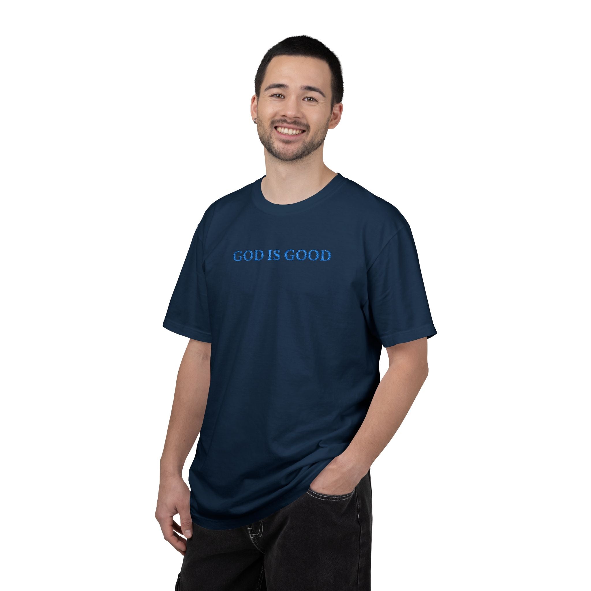 Smiling man wearing a True Navy Comfort Colors t-shirt with 'GOD IS GOOD' embroidered in cornflower blue thread