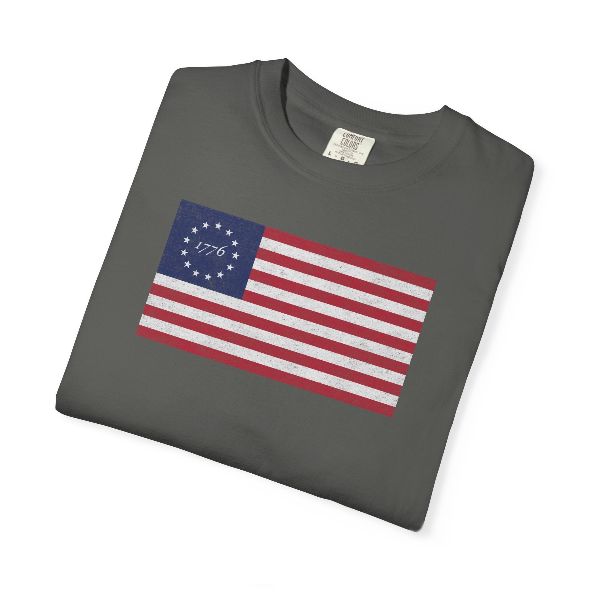 Folded distressed Betsy Ross flag 1776 t-shirt in pepper