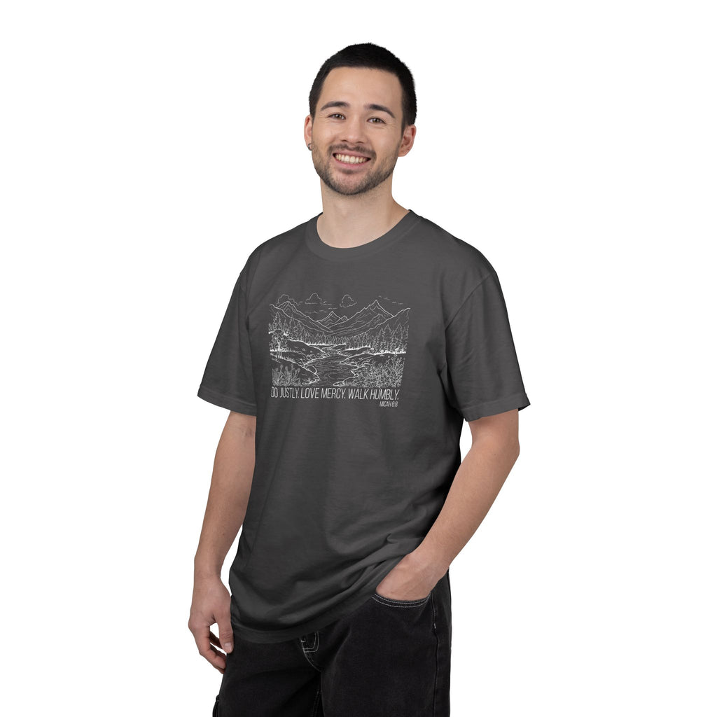 Smiling man wearing Micah 6:8 Christian t-shirt in graphite