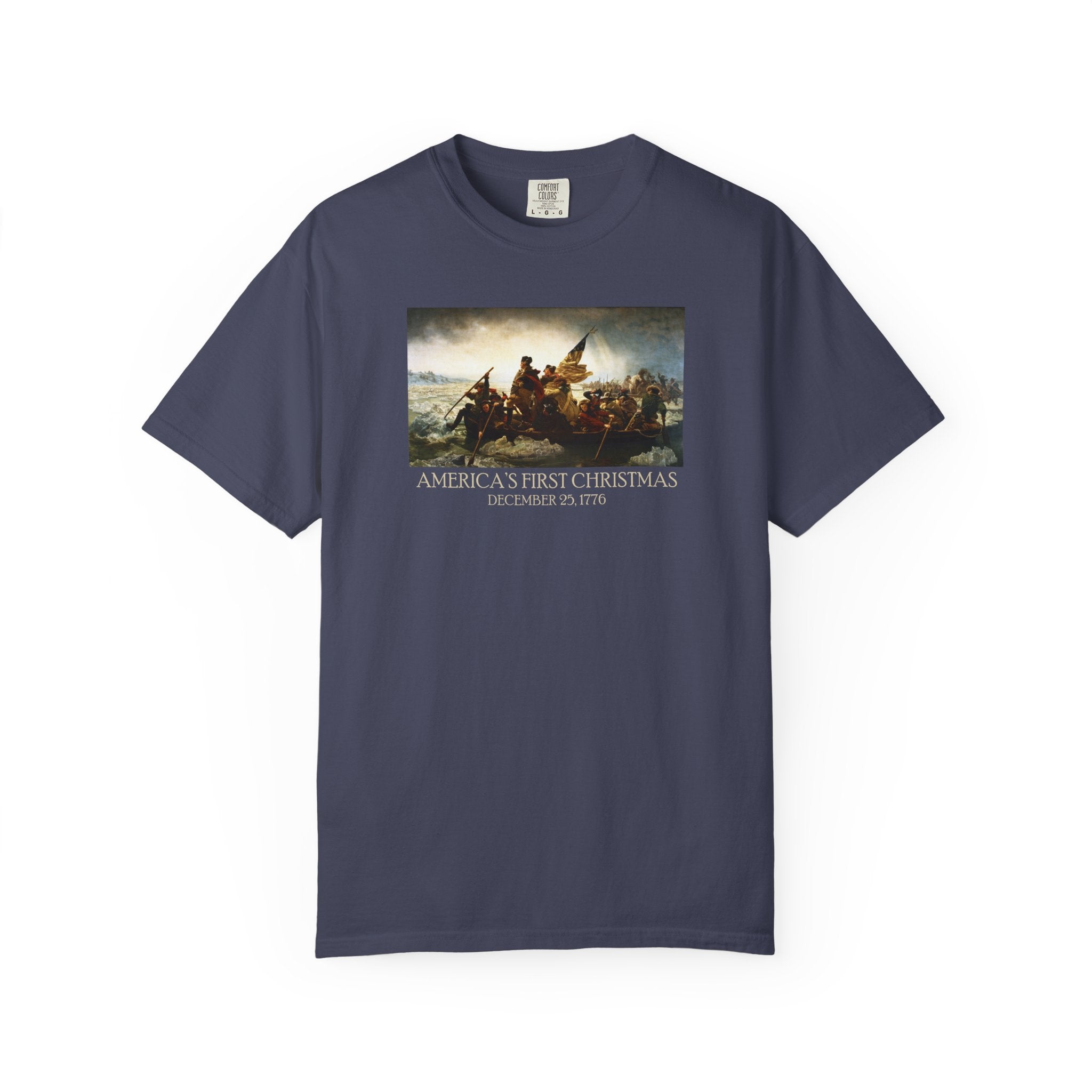 Denim Comfort Colors t-shirt with print of Emanuel Leutze’s 'Washington Crossing the Delaware' with 'America's First Christmas December 25, 1776' printed below 