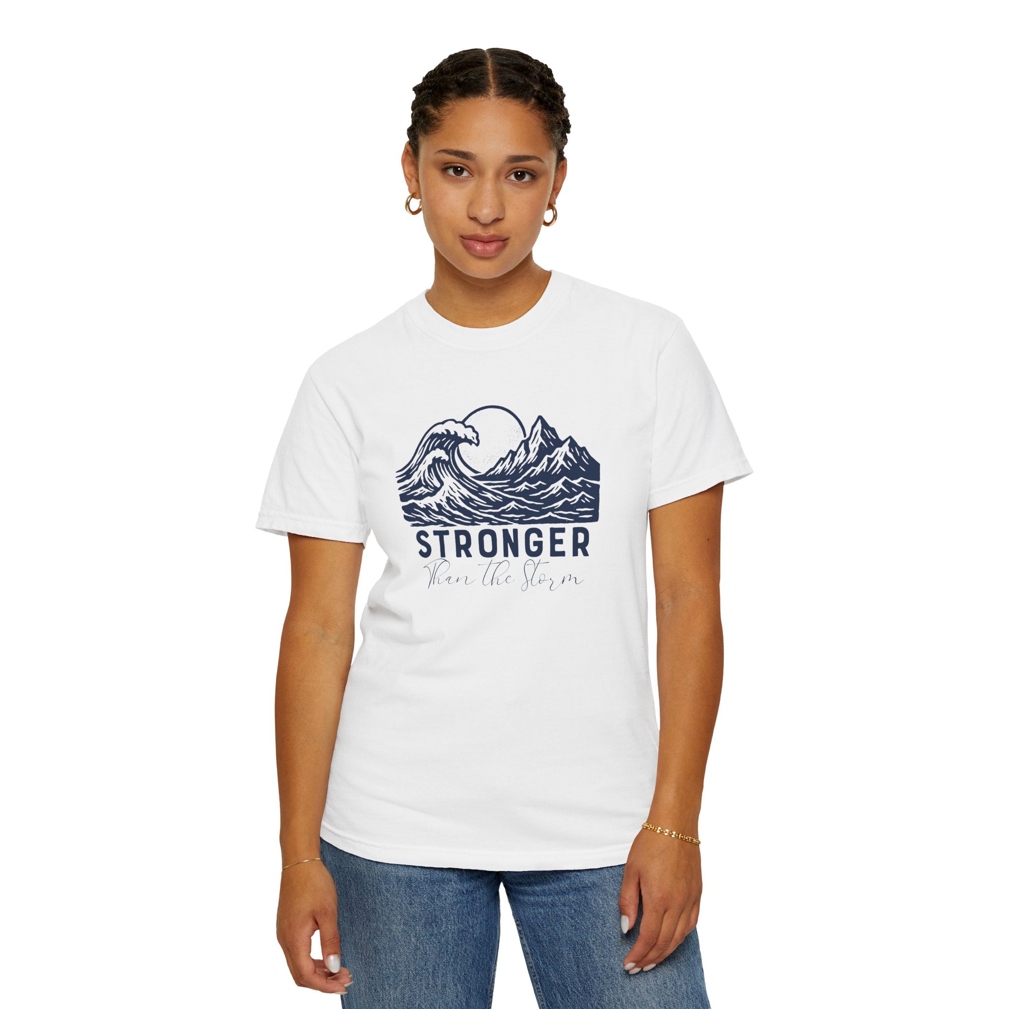 Person wearing Stronger Than The Storm faith t-shirt in white 