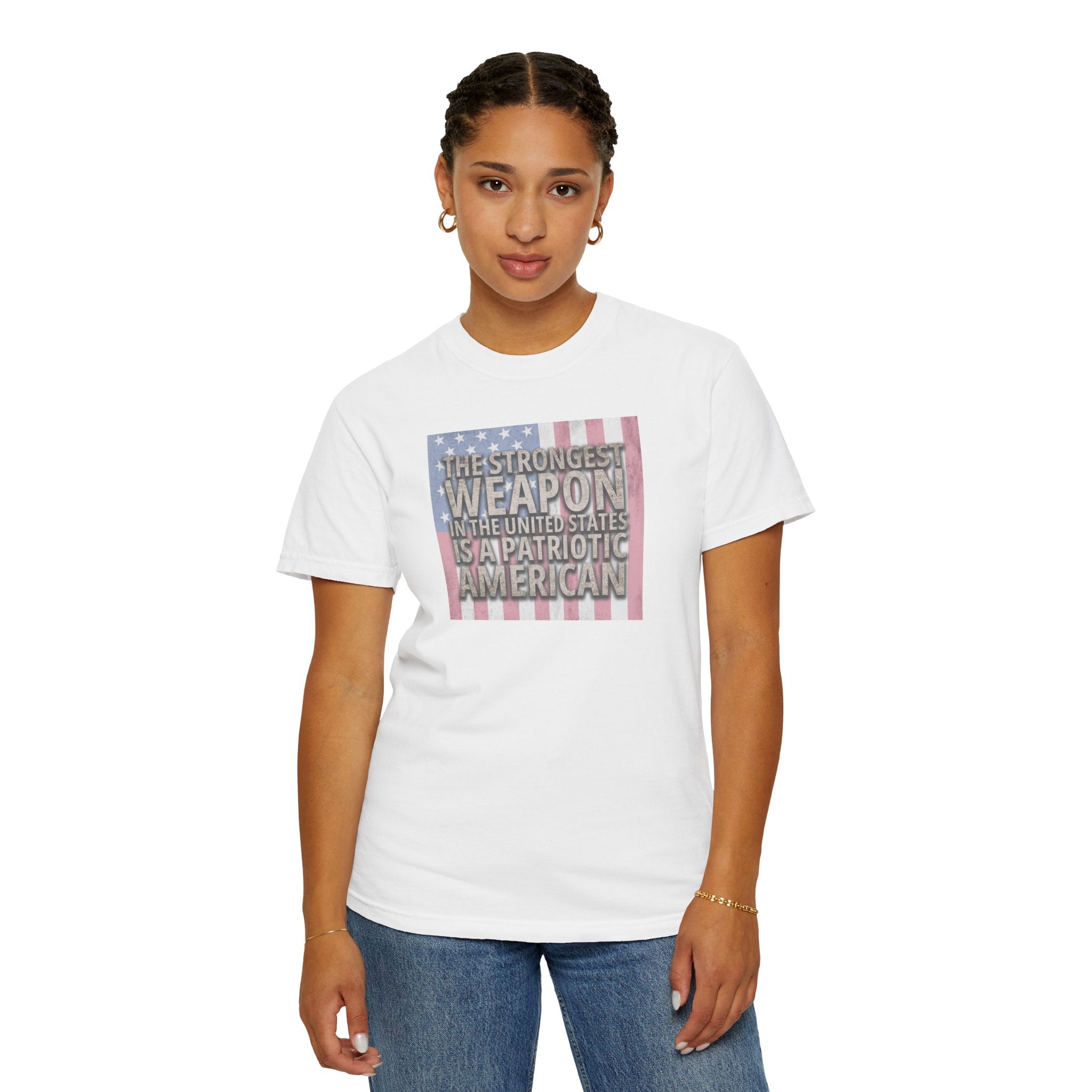 woman wearing 'The Strongest Weapon in the United States is a Patriotic American' t-shirt in white
