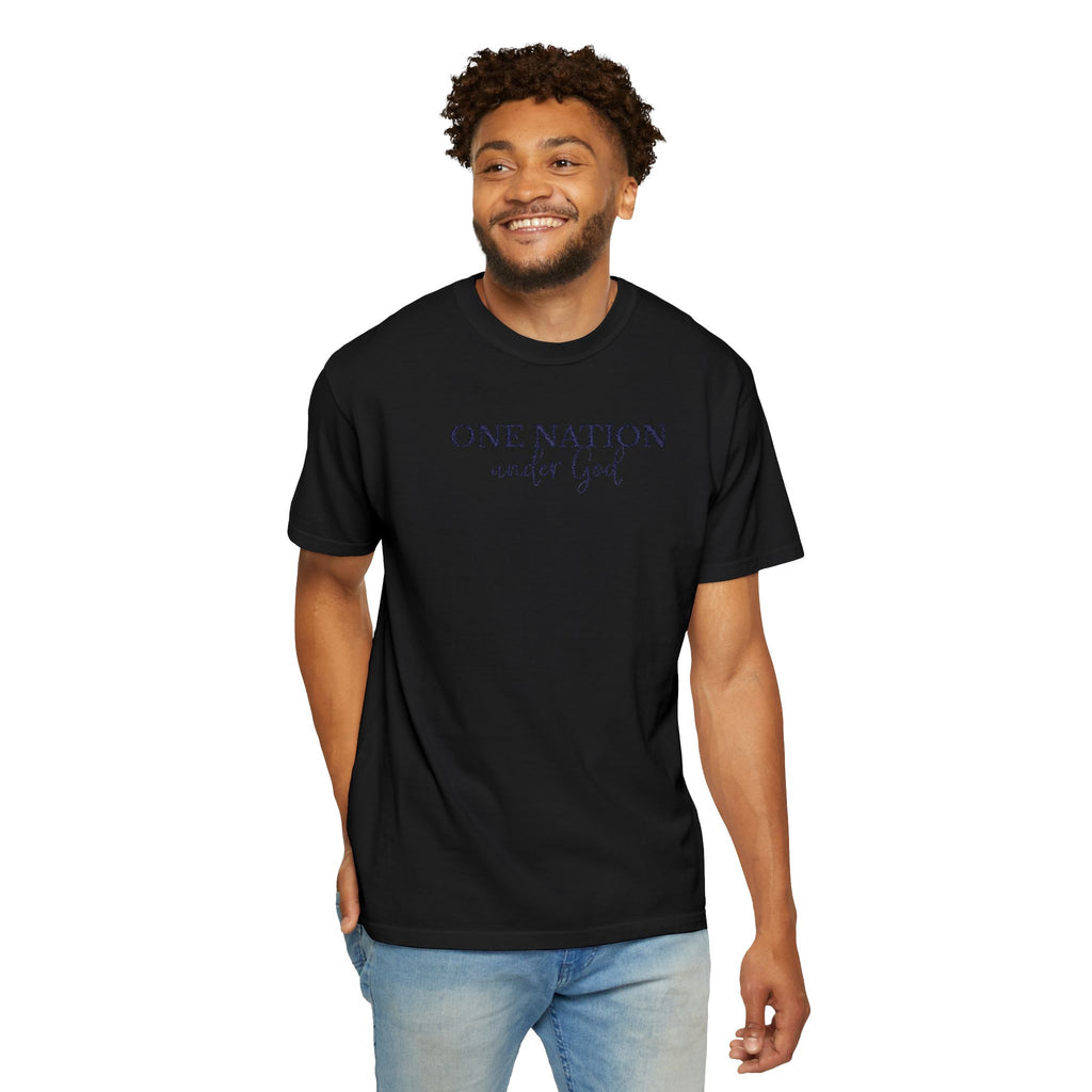 Smiling man wearing a Black Comfort Colors t-shirt with 'One Nation under God' embroidered in blue thread