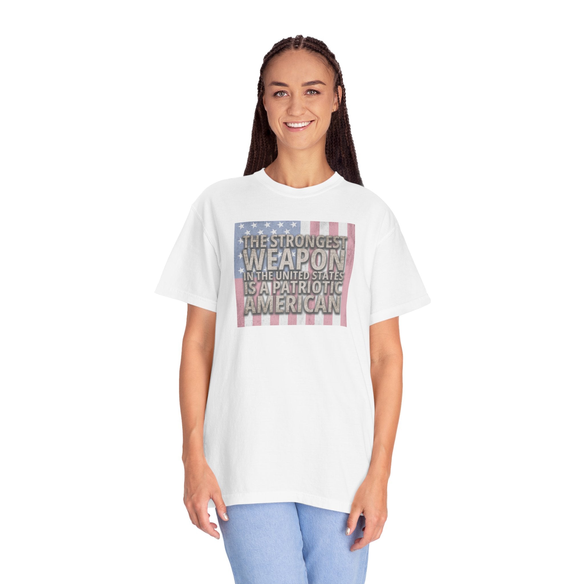woman wearing oversized 'The Strongest Weapon in the United States is a Patriotic American' t-shirt in white