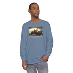 Man wearing a long-sleeve Blue Jean Comfort Colors t-shirt with Leutze's 'Washington Crossing the Delaware' with 'America's First Christmas December 25, 1776 printed below