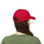 Back view of woman wearing a Cranberry dad cap embroidered with '1776'