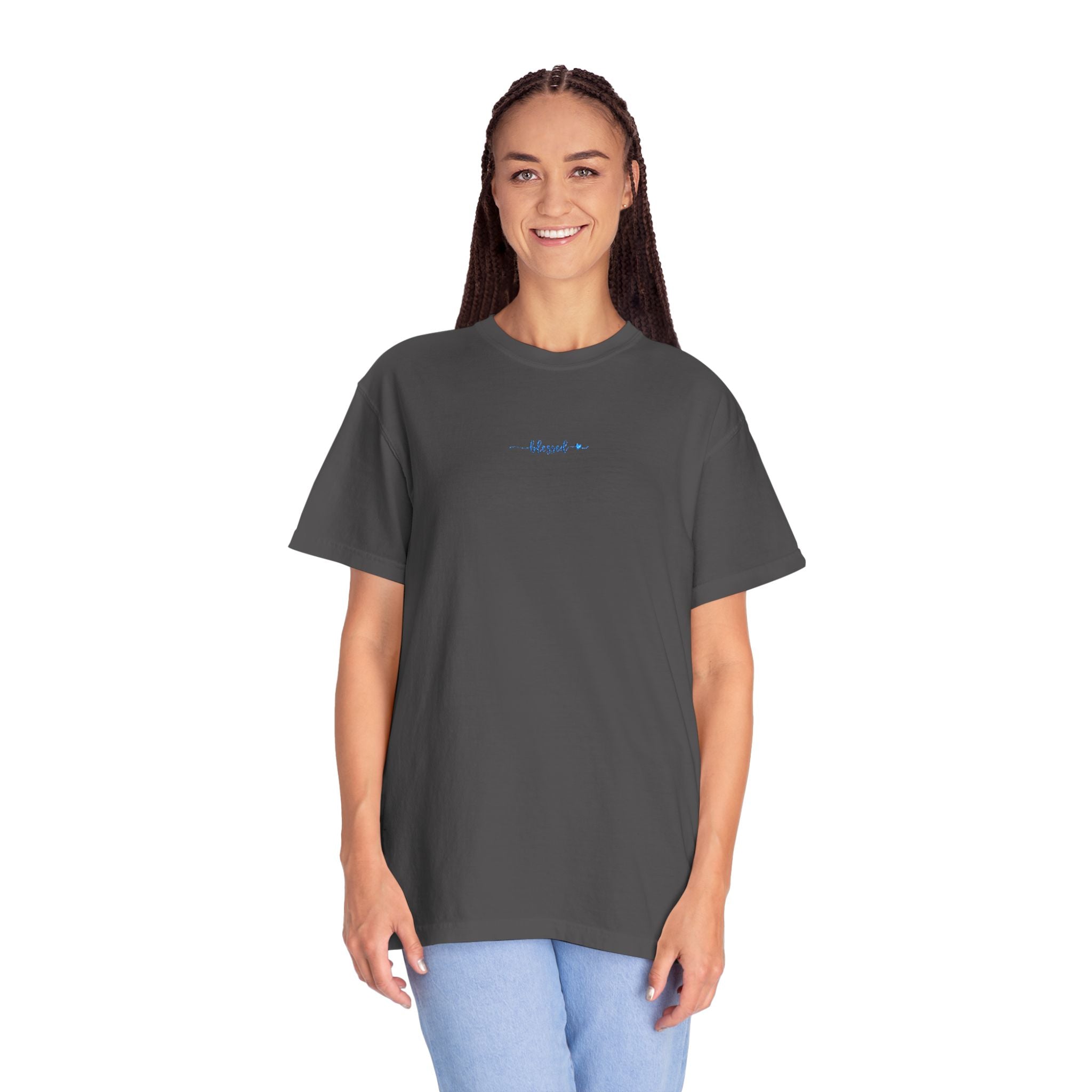 Smiling woman wearing an oversized Graphite Comfort Colors t-shirt with 'blessed' embroidered in cornflower blue thread