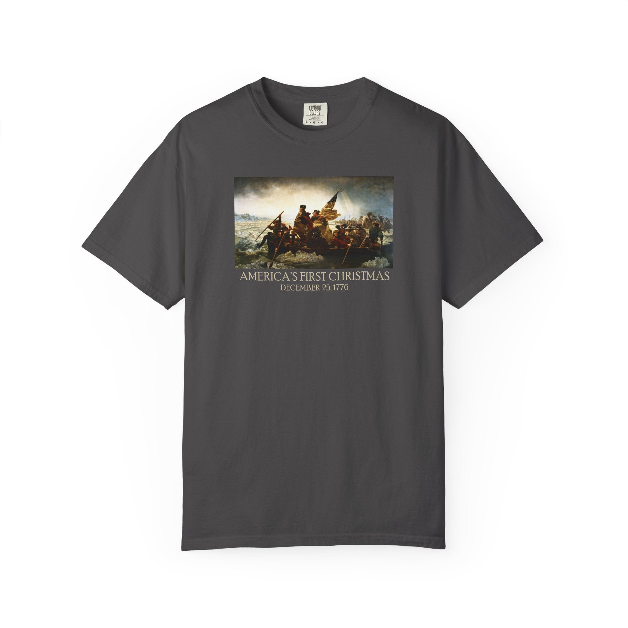 Graphite Comfort Colors t-shirt with print of Emanuel Leutze’s 'Washington Crossing the Delaware' with 'America's First Christmas December 25, 1776' printed below 