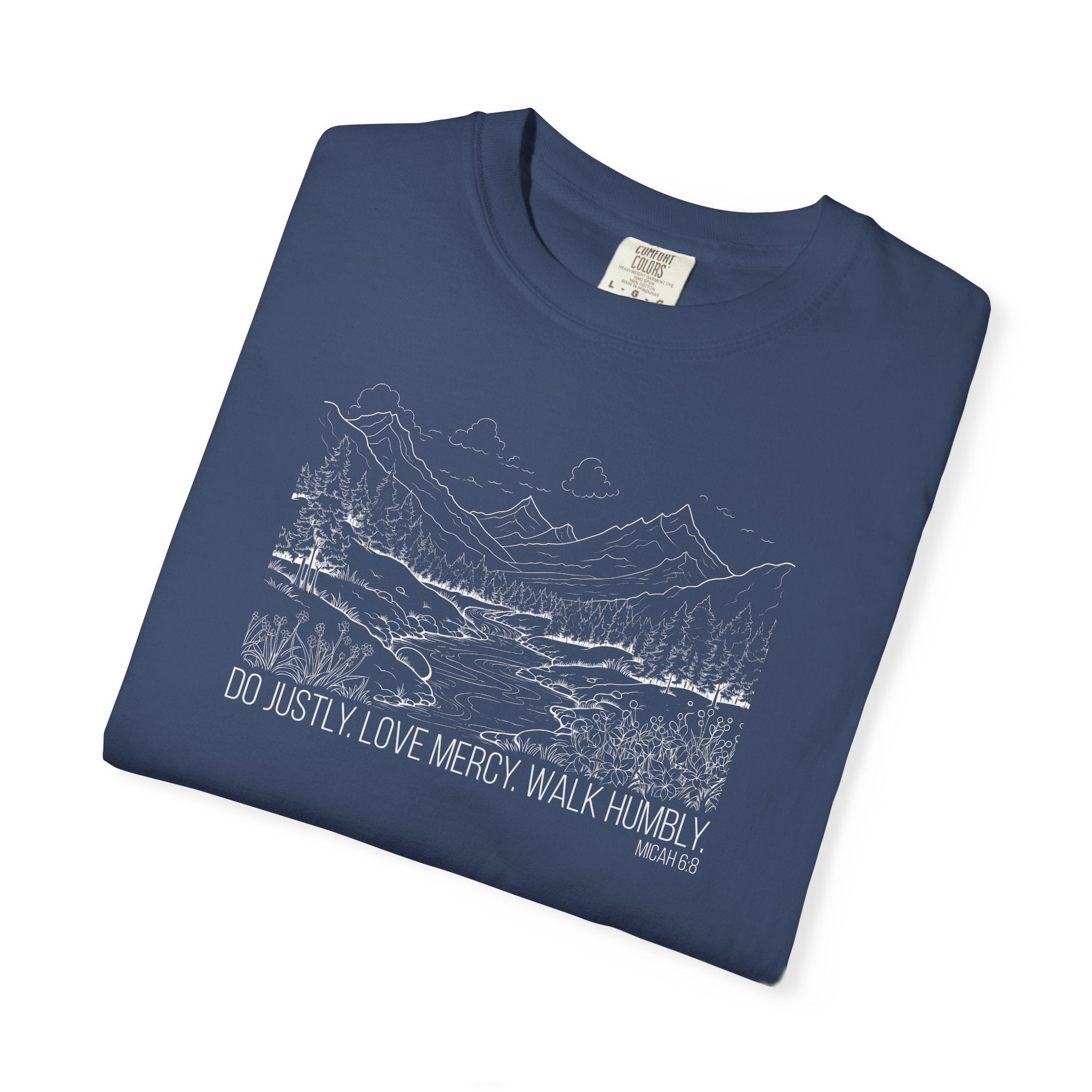 Folded China Blue Comfort Colors t-shirt with mountain river design and Bible verse from Micah 6:8
