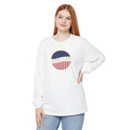 Woman wearing a long sleeve white Comfort Colors t-shirt with America 250 design