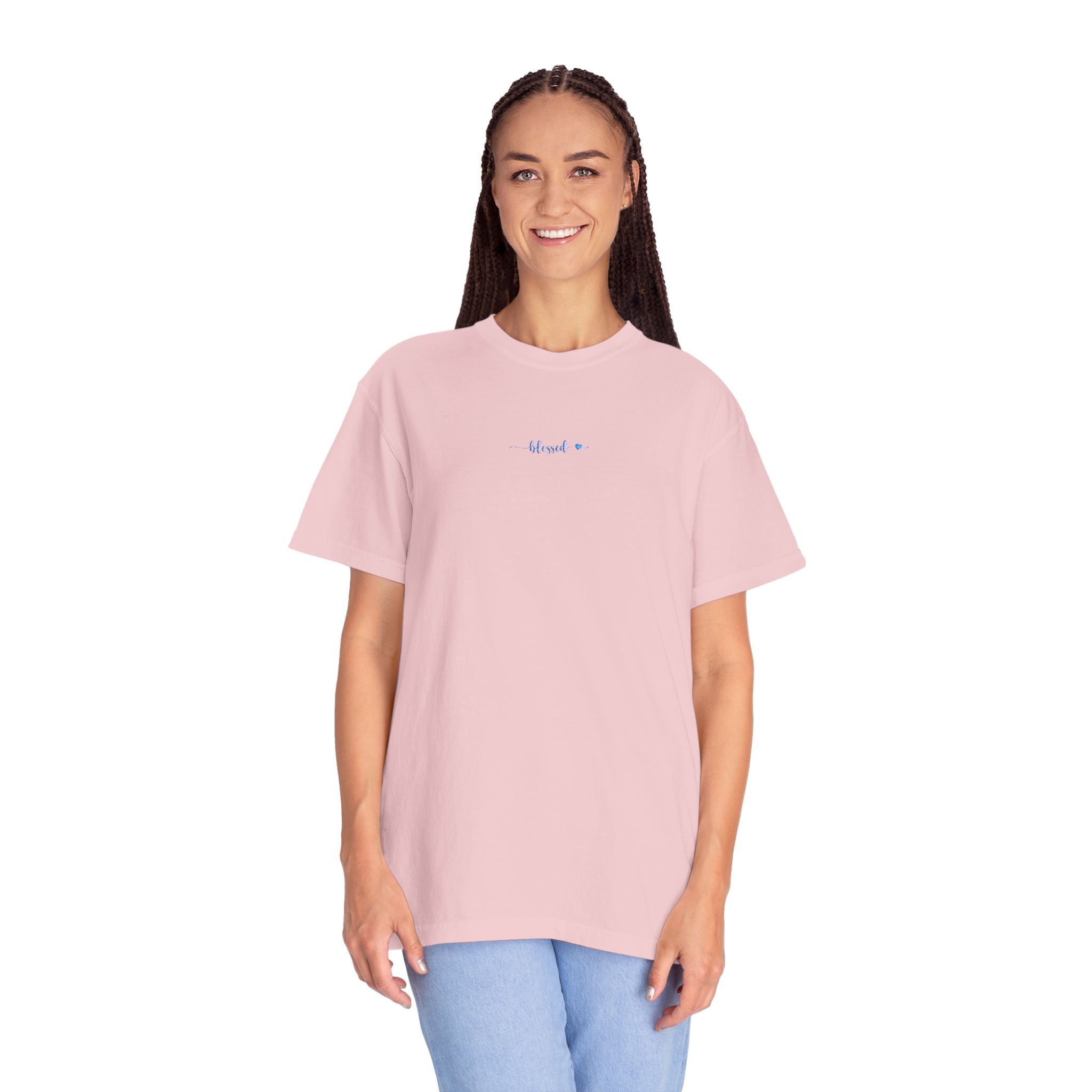 Smiling woman wearing an oversized Blossom Comfort Colors t-shirt with 'blessed' embroidered in cornflower blue thread