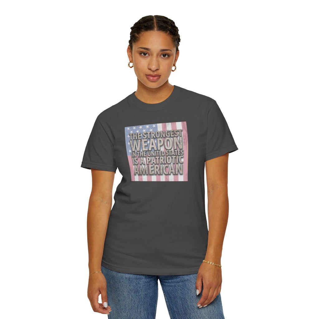 woman wearing 'The Strongest Weapon in the United States is a Patriotic American' t-shirt in graphite