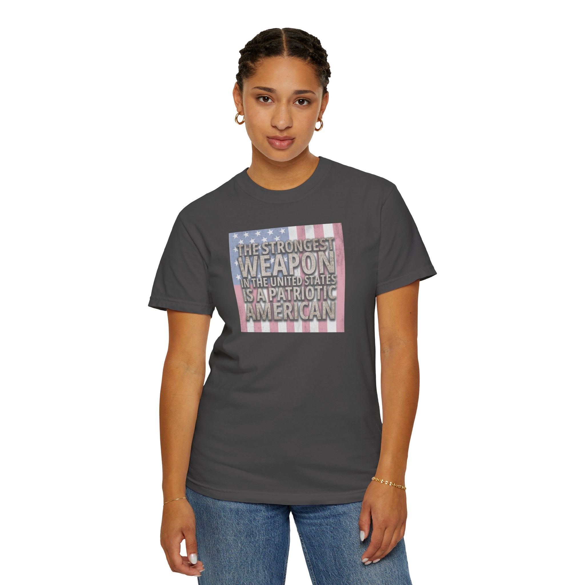 woman wearing 'The Strongest Weapon in the United States is a Patriotic American' t-shirt in graphite
