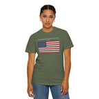 Woman wearing a Sage Comfort Colors t-shirt with distressed American flag graphic and 'They Walked Into the Wrong Republic' quote from Entheos