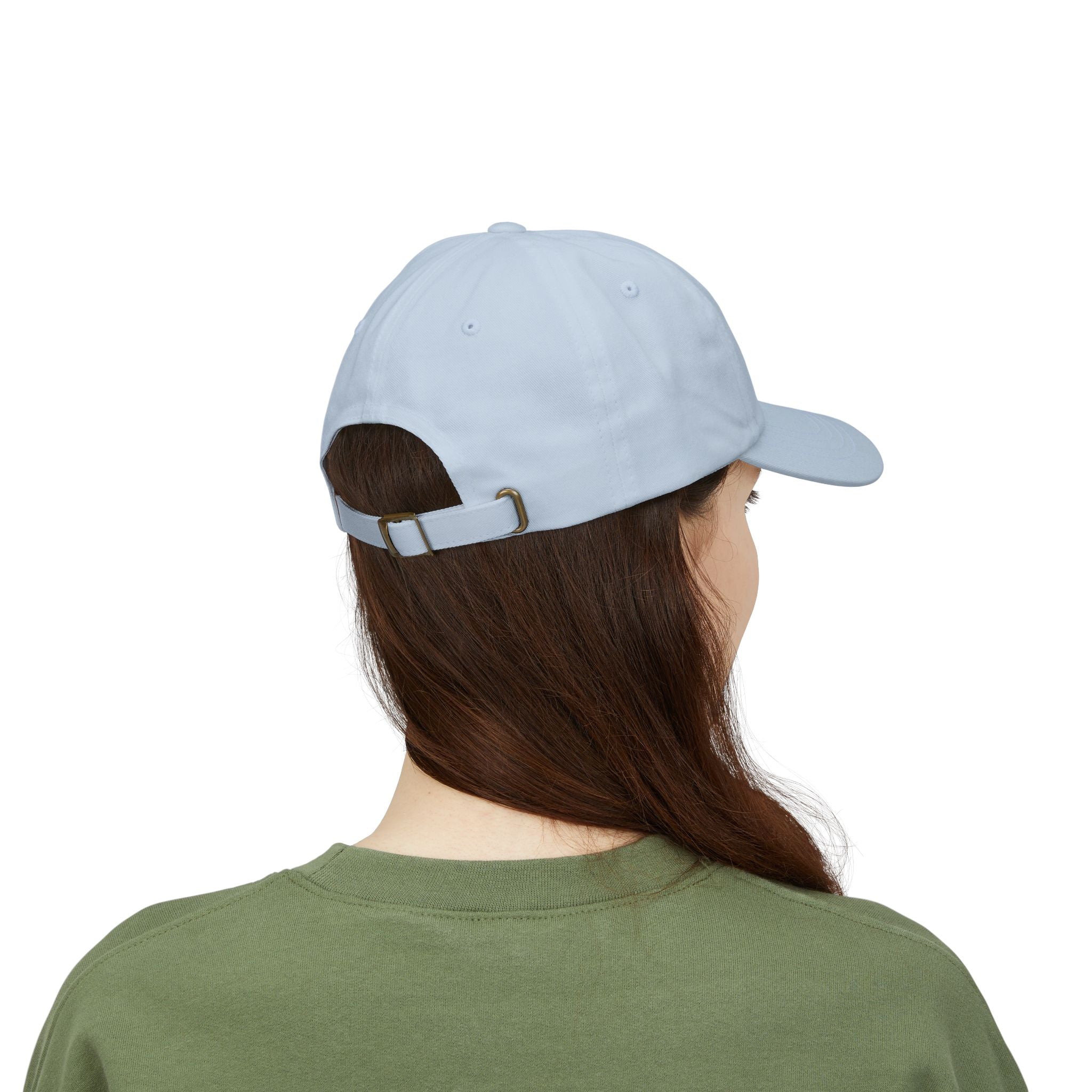 Back view of a woman wearing a light blue baseball cap