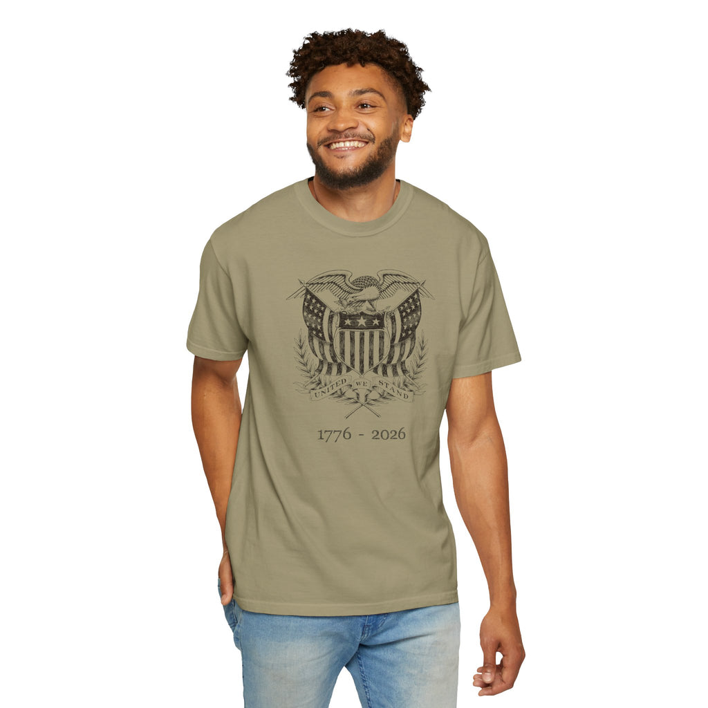 Smiling man wearing a khaki United We Stand eagle t-shirt