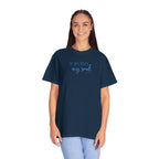 Smiling woman wearing an oversized True Navy Comfort Colors t-shirt with 'He restores my soul' embroidered in cornflower blue thread