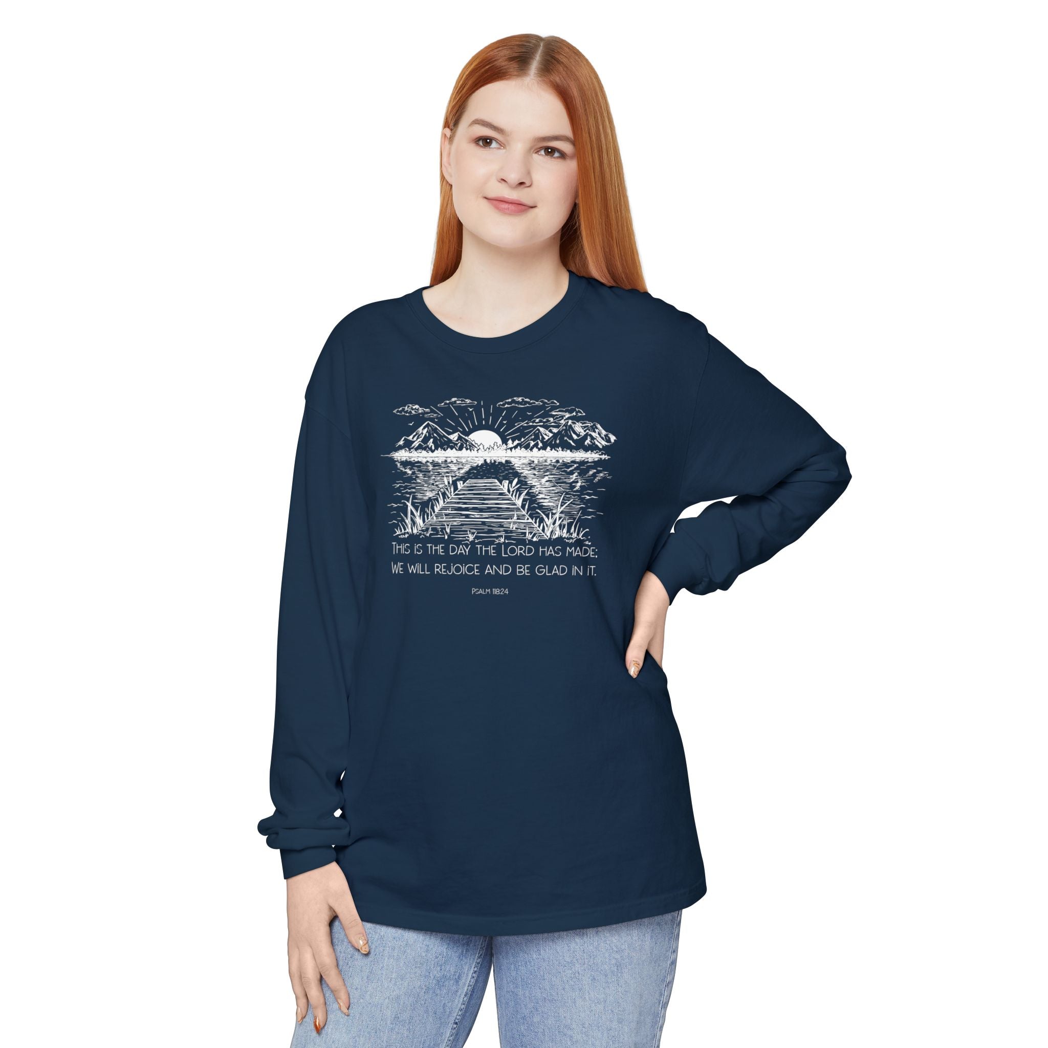 Woman wearing a long-sleeve True Navy Comfort Colors t-shirt with nature graphic and Psalm 118:24
