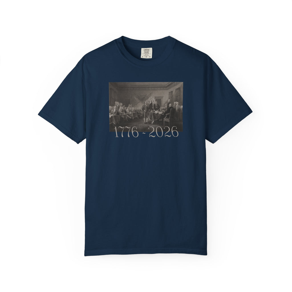 True Navy Comfort Colors t-shirt with a printed design of Trumbull's  'Declaration of Independence' painting with '1776-2026' in overlapping revolutionary era text