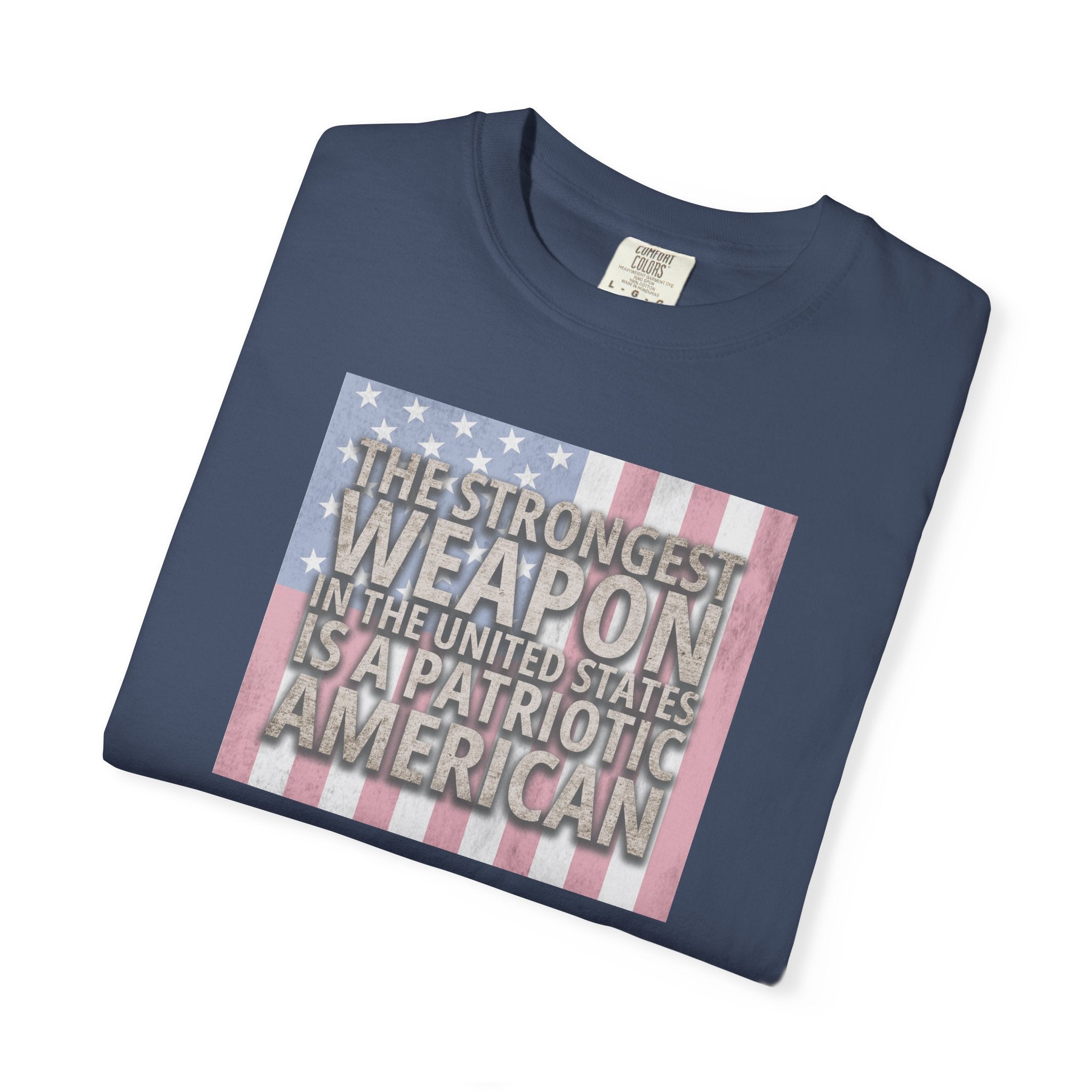 Folded 'The Strongest Weapon in the United States is a Patriotic American' t-shirt in midnight