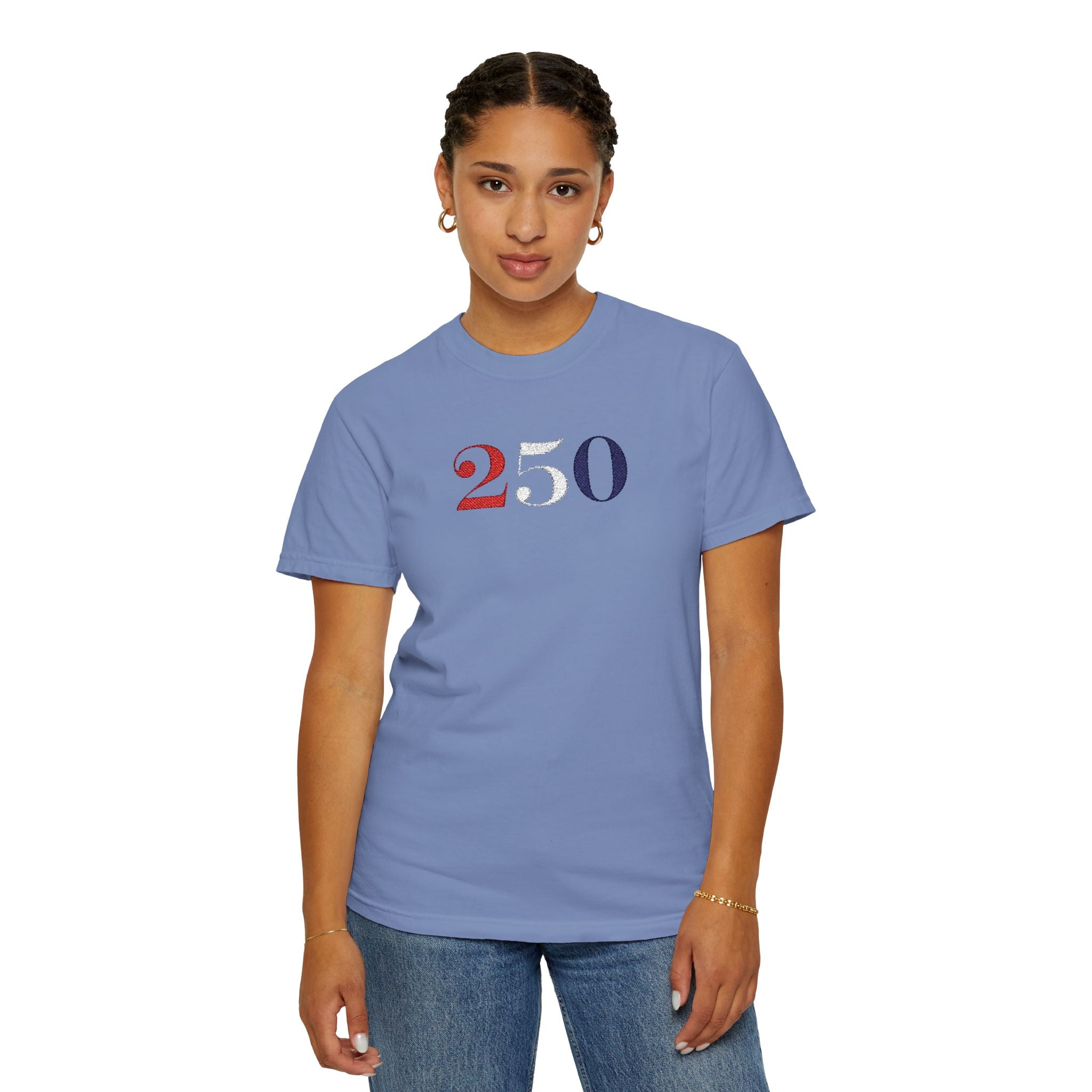 Female model wearing washed denim America 250 embroidered t-shirt