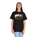 Woman wearing an oversized Black Comfort Colors t-shirt with print of Emanuel Leutze’s 'Washington Crossing the Delaware' with 'America's First Christmas December 25, 1776' printed below 
