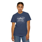 Woman wearing China Blue Comfort Colors t-shirt with nature graphic and 'This is the day the Lord has made; We will rejoice and be glad in it' below