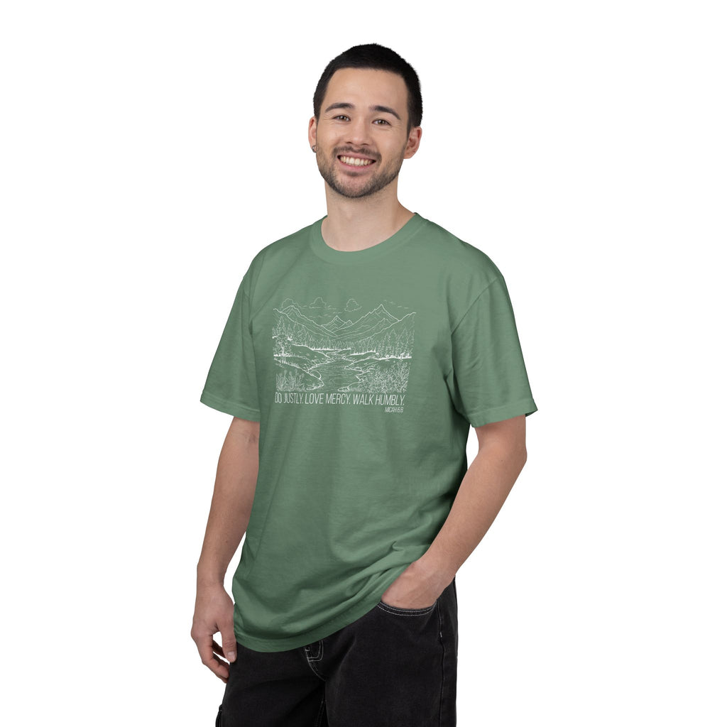 Smiling man wearing Micah 6:8 Christian t-shirt in light green

