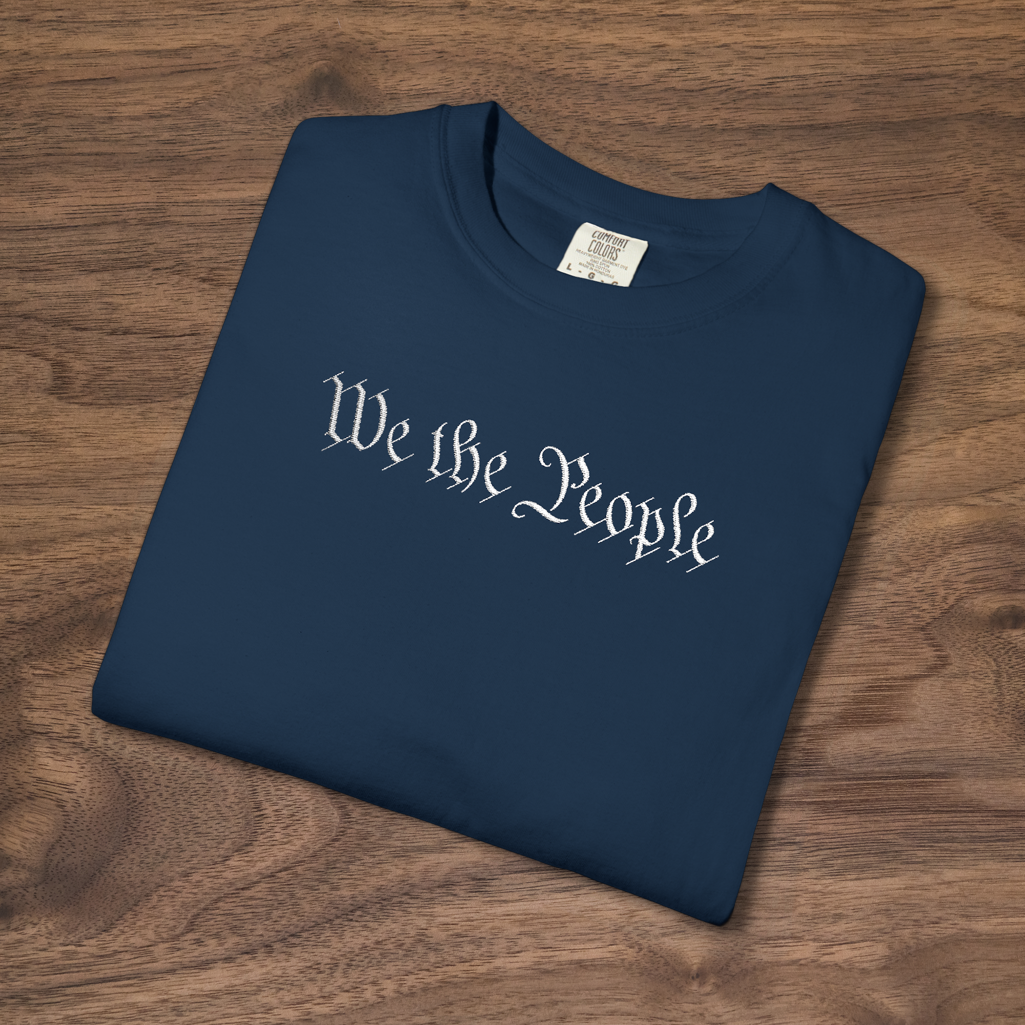 We the People embroidered patriotic t-shirt in true navy on Comfort Colors blank, Constitution script design

